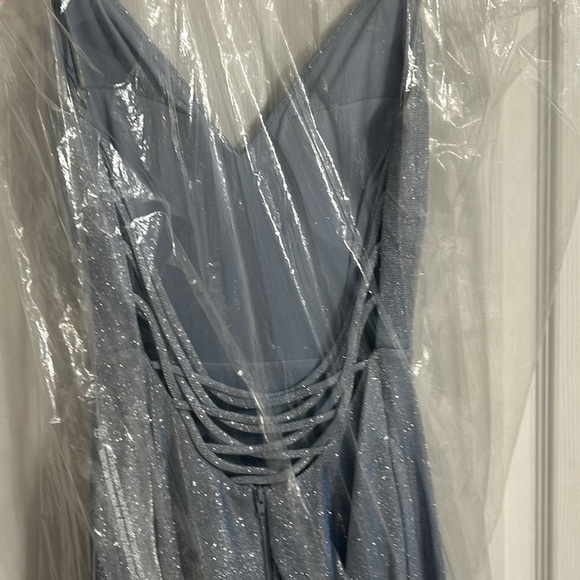 I am selling a sleeveless prom dress that is sparkly blue purplish a size small - Picture 5 of 7